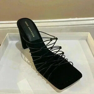 Good American sandals slip on caged black heels made in Spain. 8.5. New